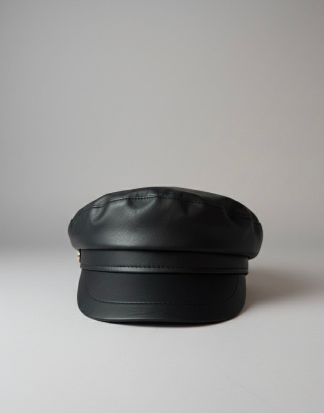 Black faux leather cabbie hat